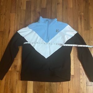 Woman’s Fila Blue, Black, And White Pull Over quarter Zip Crew Neck Size Large